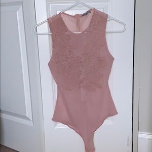 Pink lace body suit